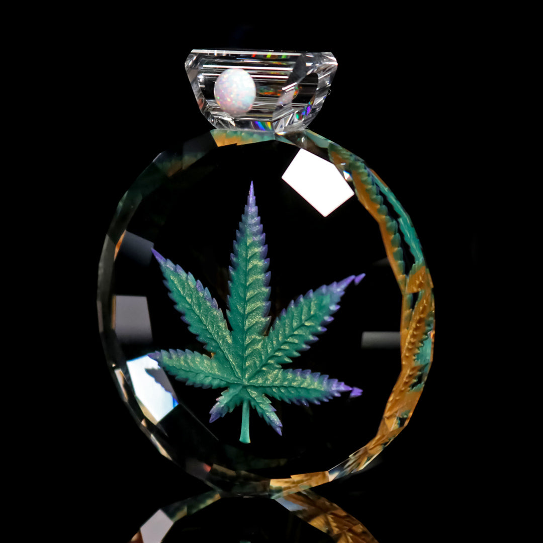 Faceted Bipolar Encased Leaf Pendant