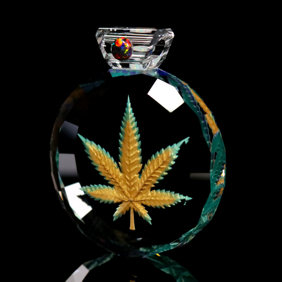 Faceted Bipolar Encased Leaf Pendant